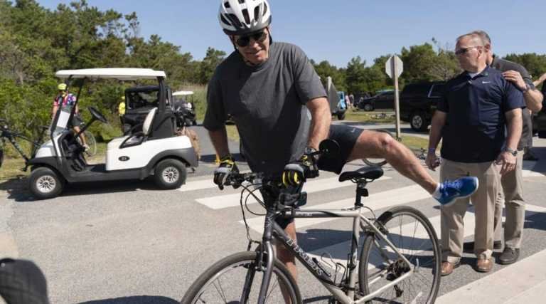 Biden takes spill while getting off bike after beach ride – Travel India Alone